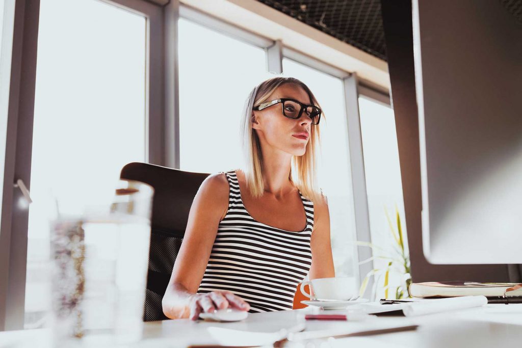 attractive woman working on her desktop