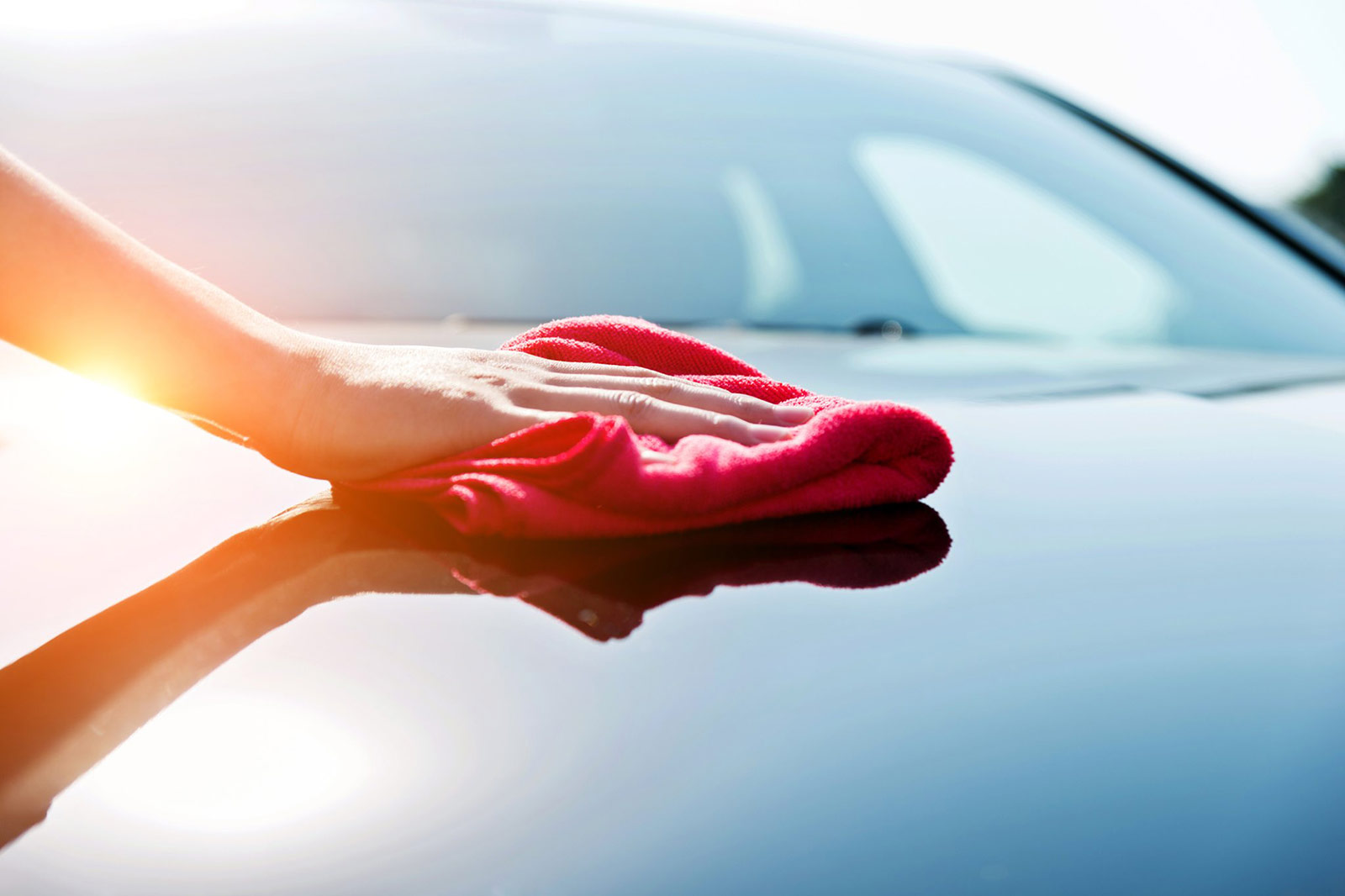 wiping down a car