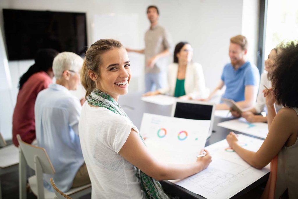 smiling women at business meeting