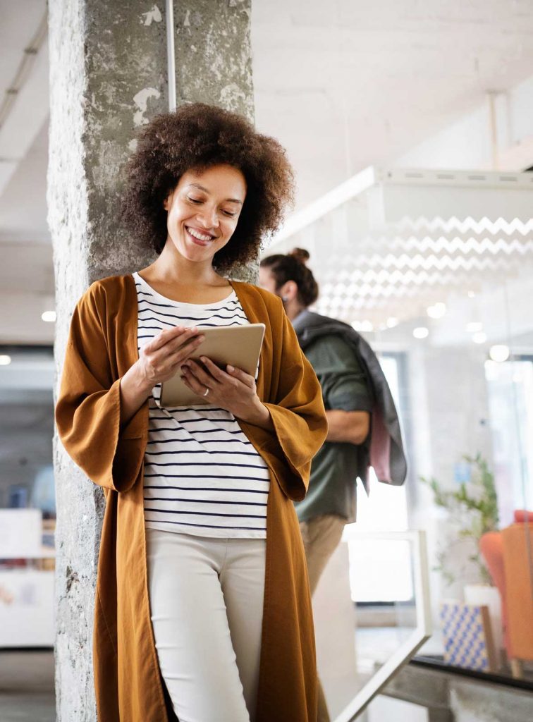 women looking at ipad