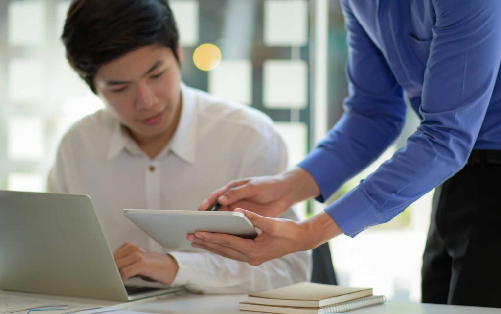 working team with laptop