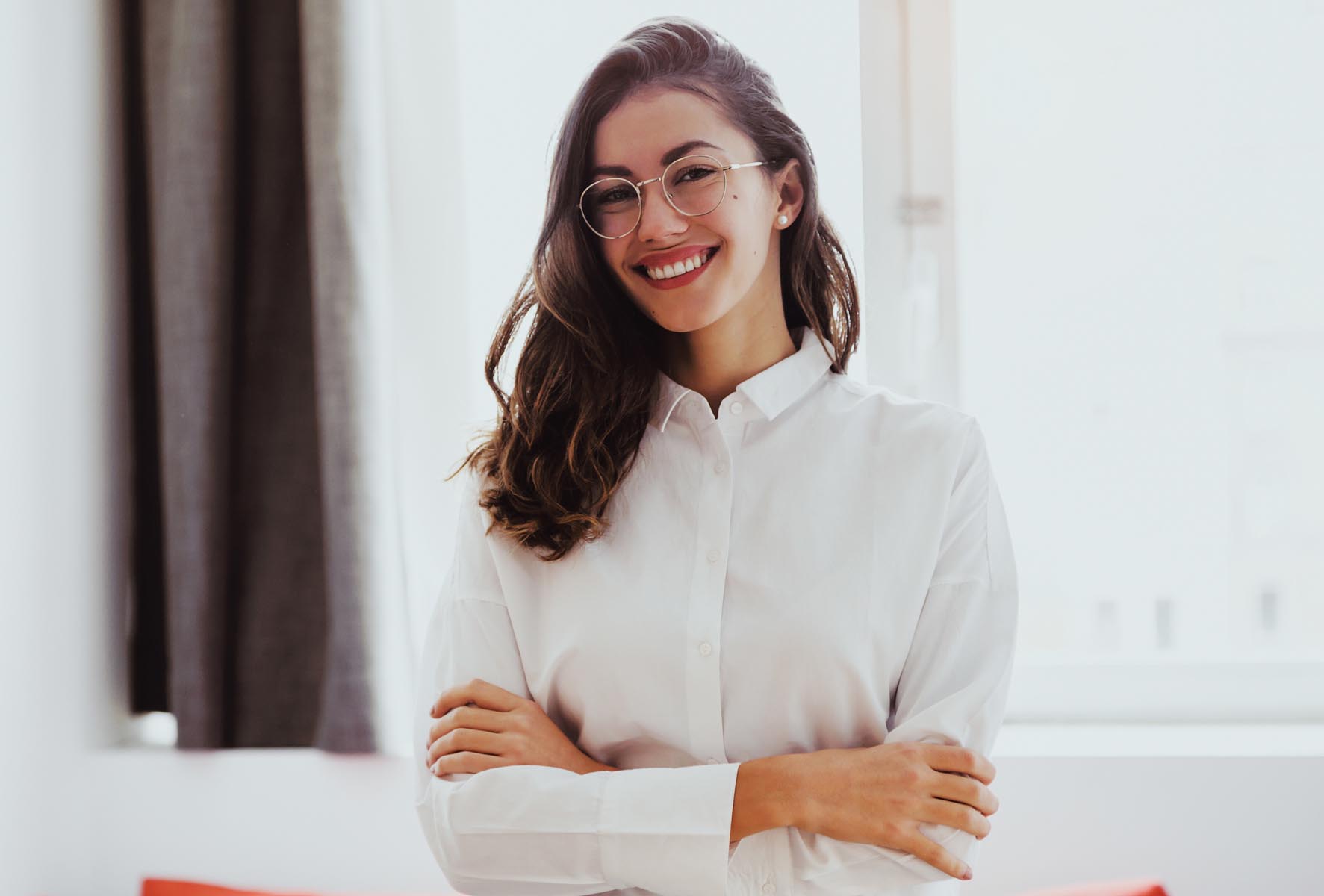 Woman smiling in an office