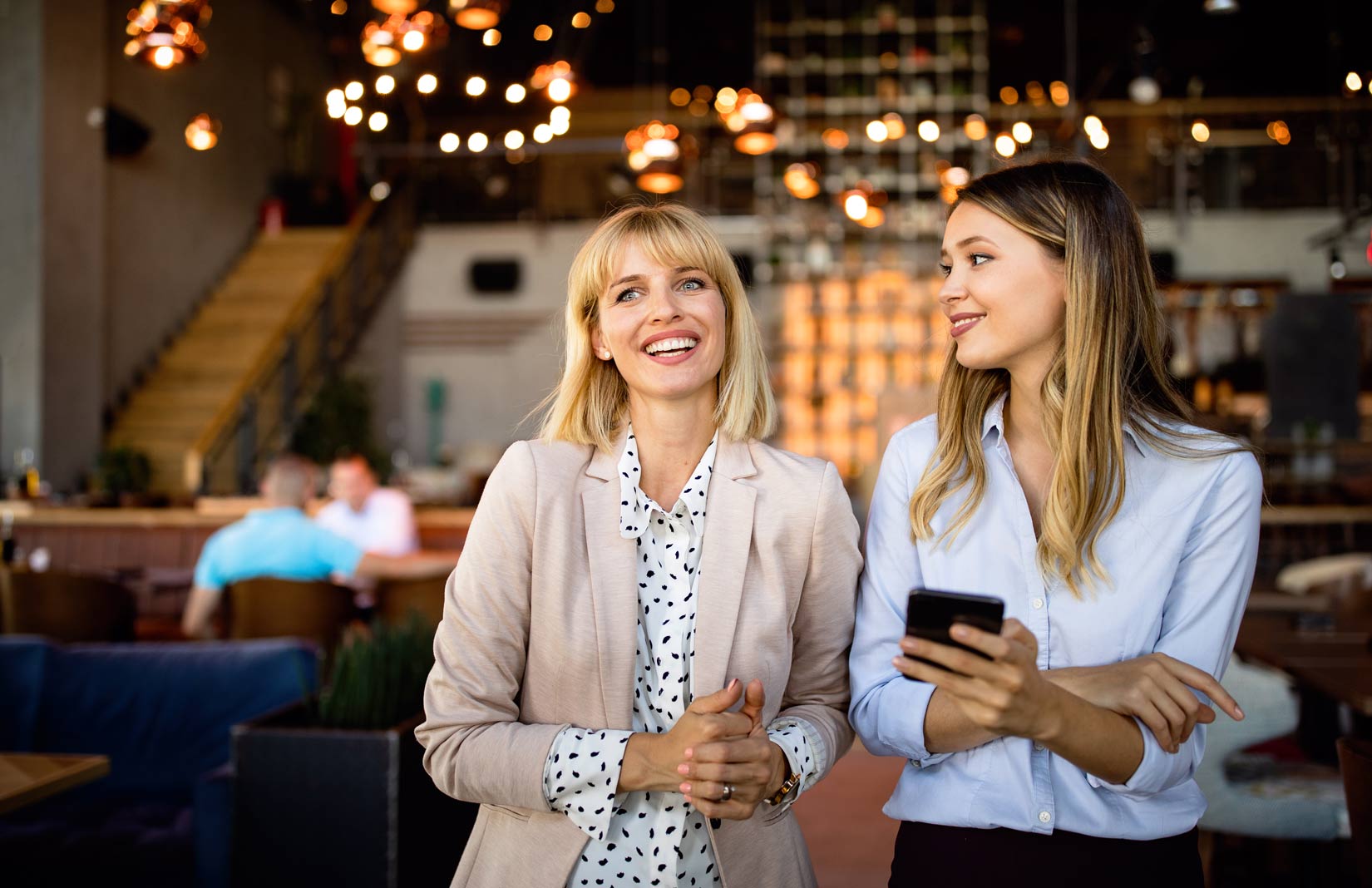 Two female workers having a conversation